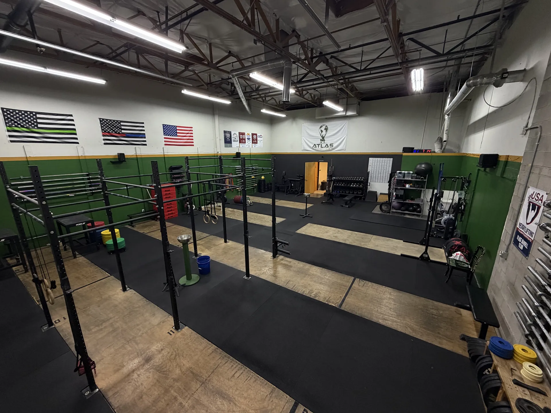 Wide view across the Atlas training floor, rig, and lifting platforms