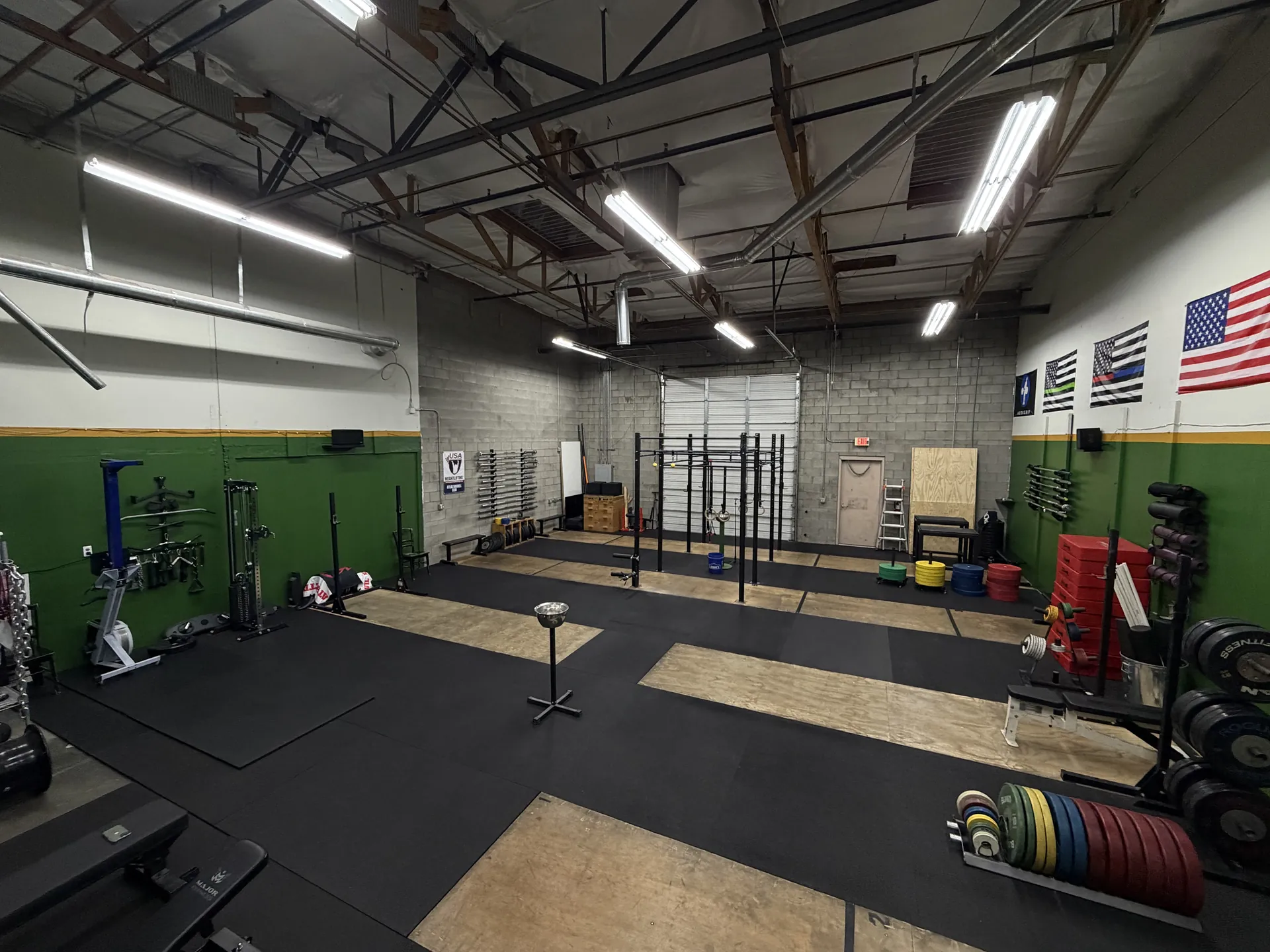 Wide view of the training floor and platforms from the opposite end